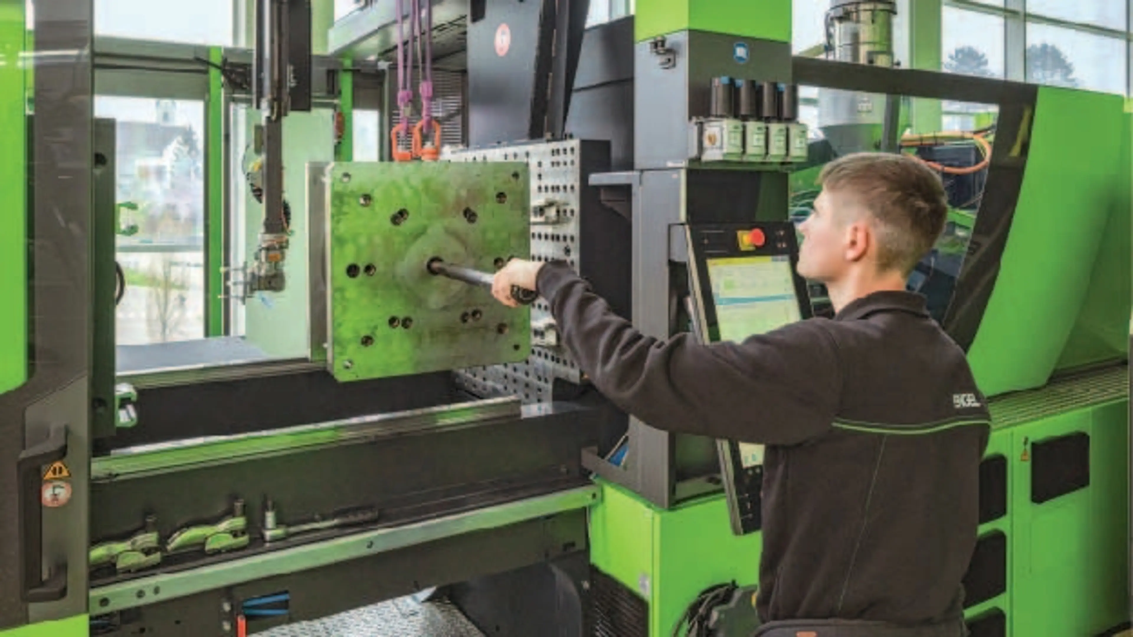 Engel machine and man operator