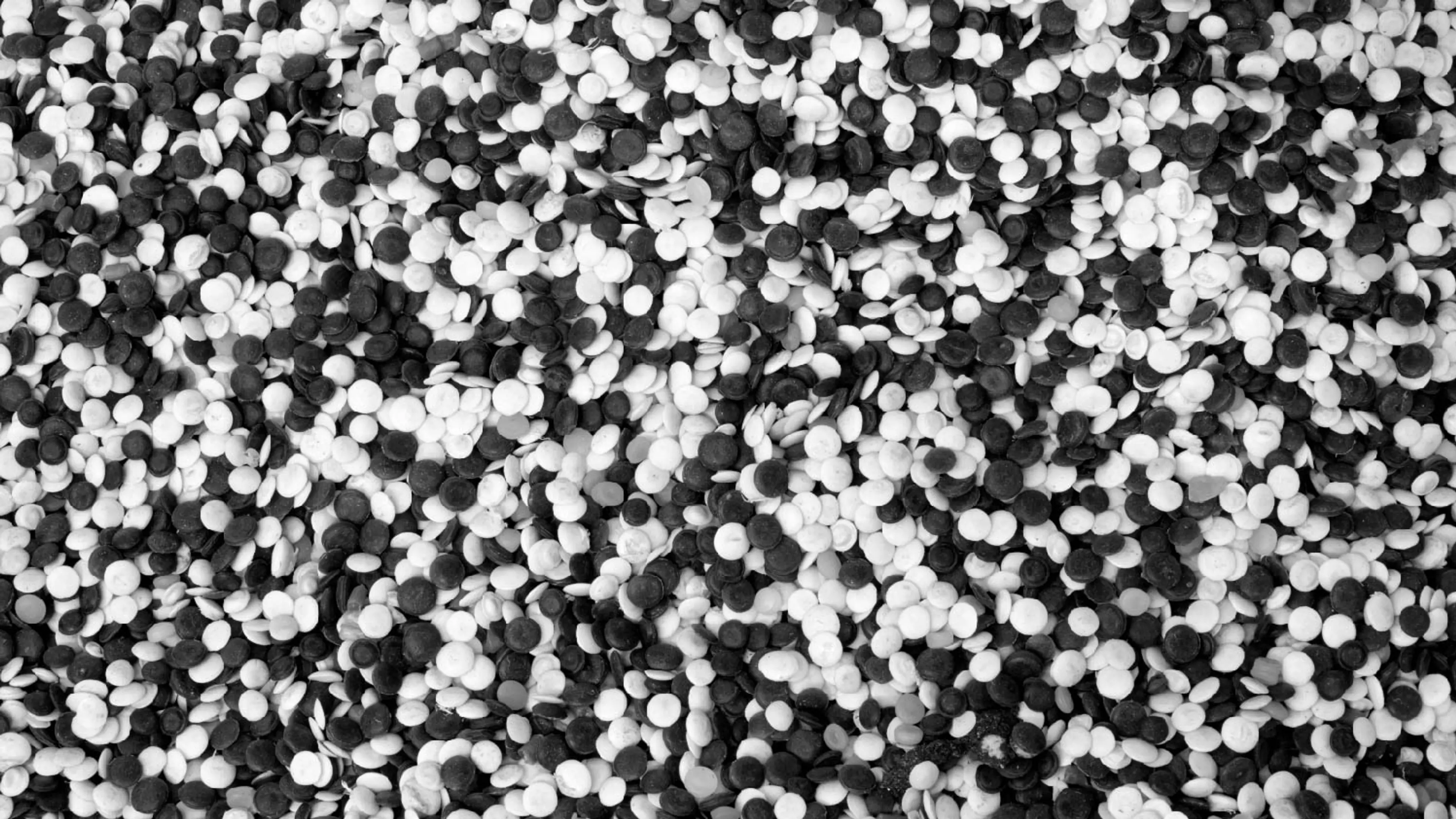 Black and white plastic pellets