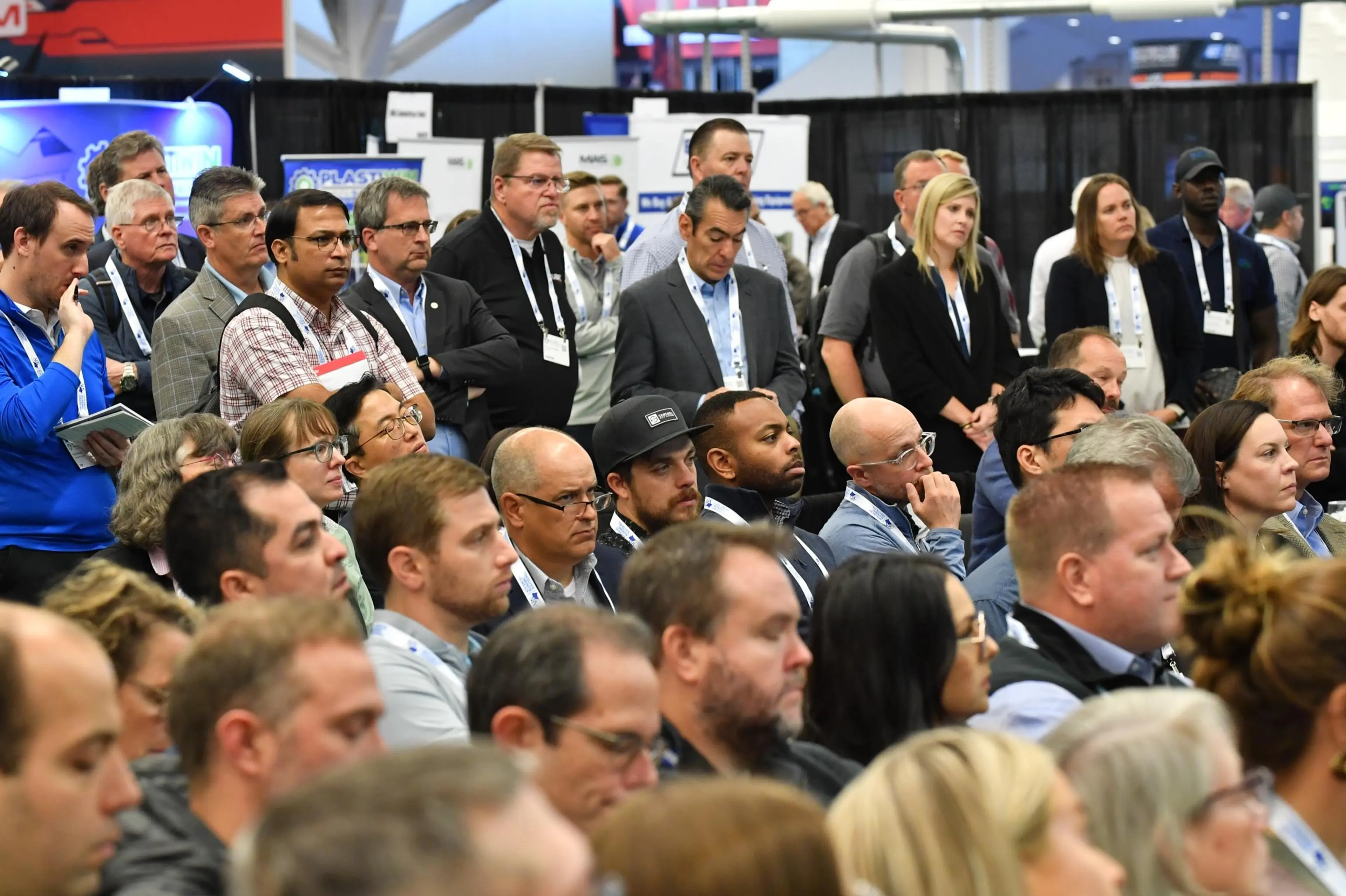 Busy theatre audience at AMI's Expo