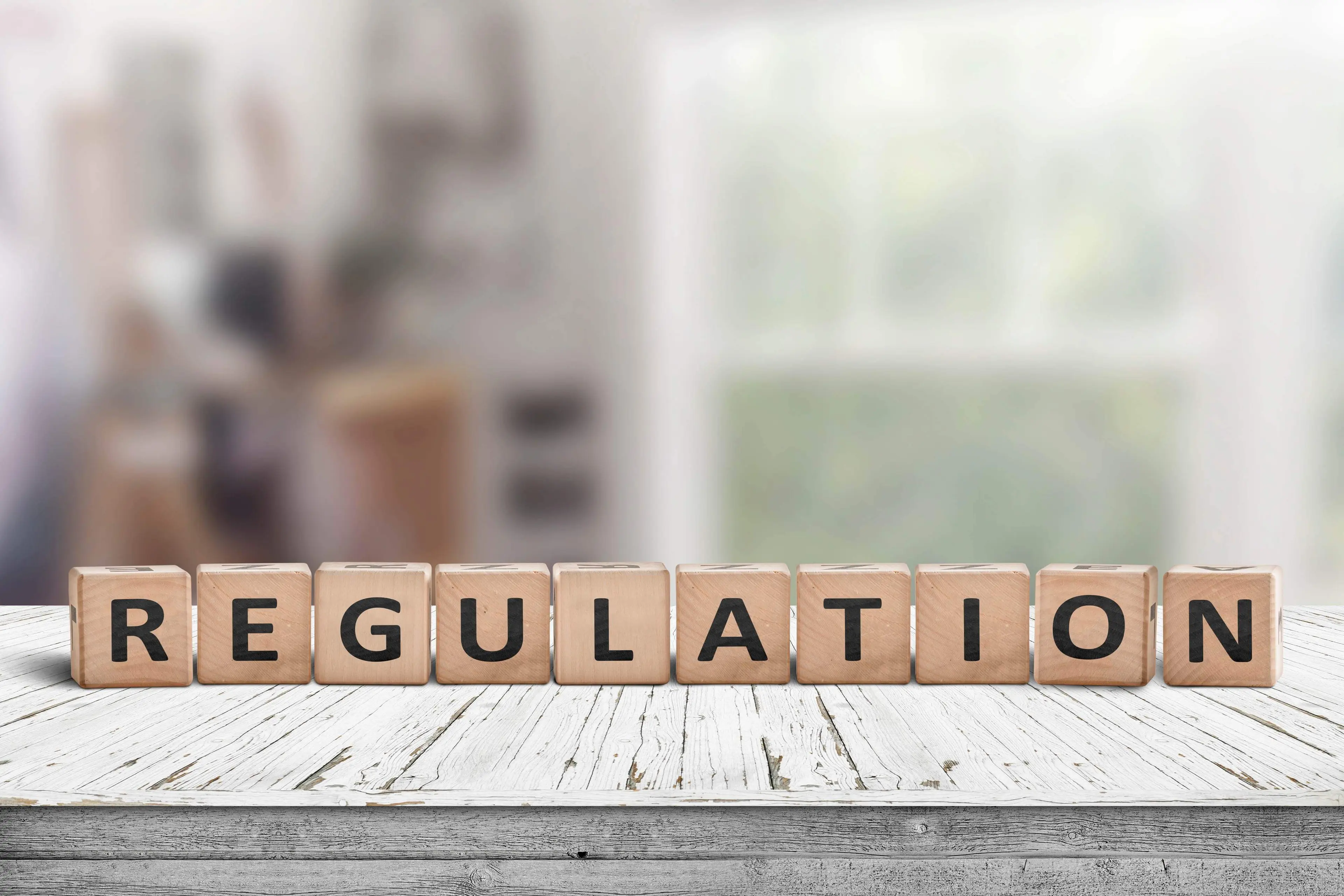 image of wooden blocks spelling out Regulations
