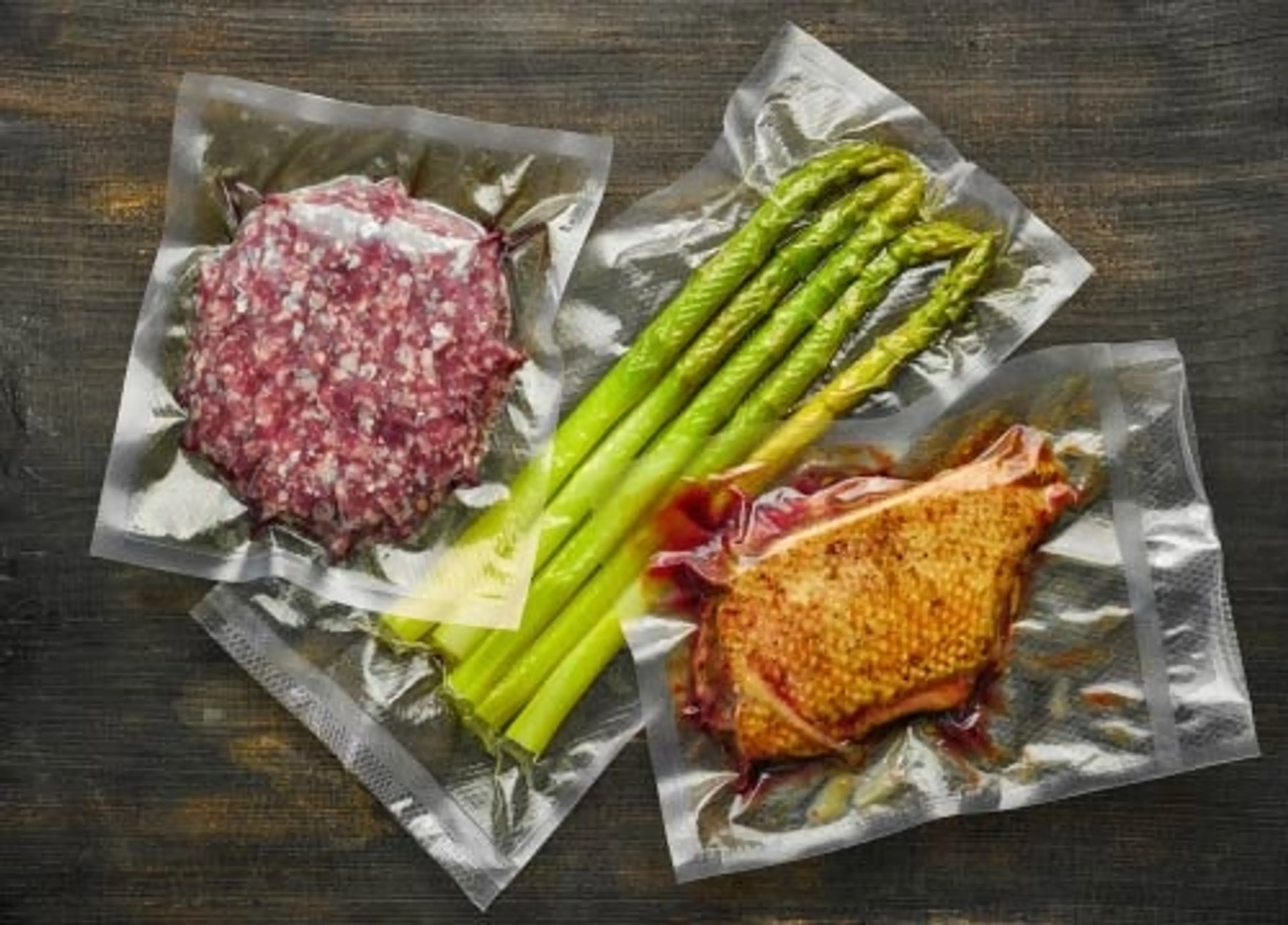 Meat, fish and asparagus shrink wrapped in HB film