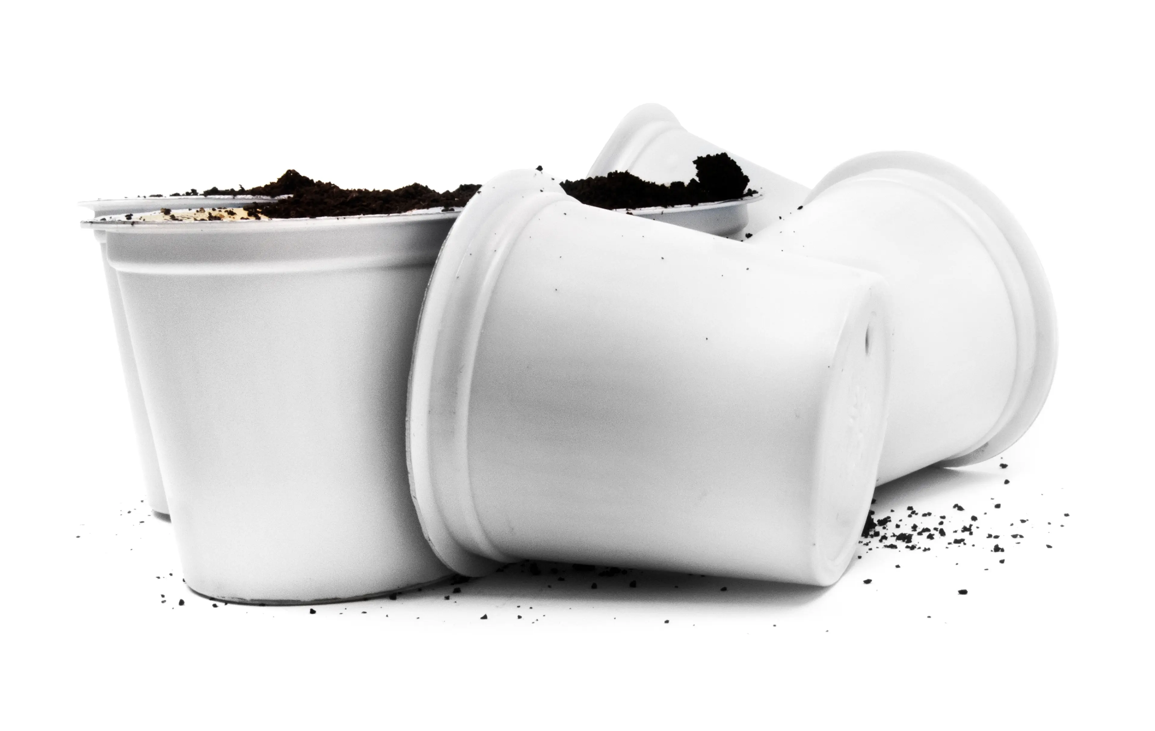 White single serve capsules on white background