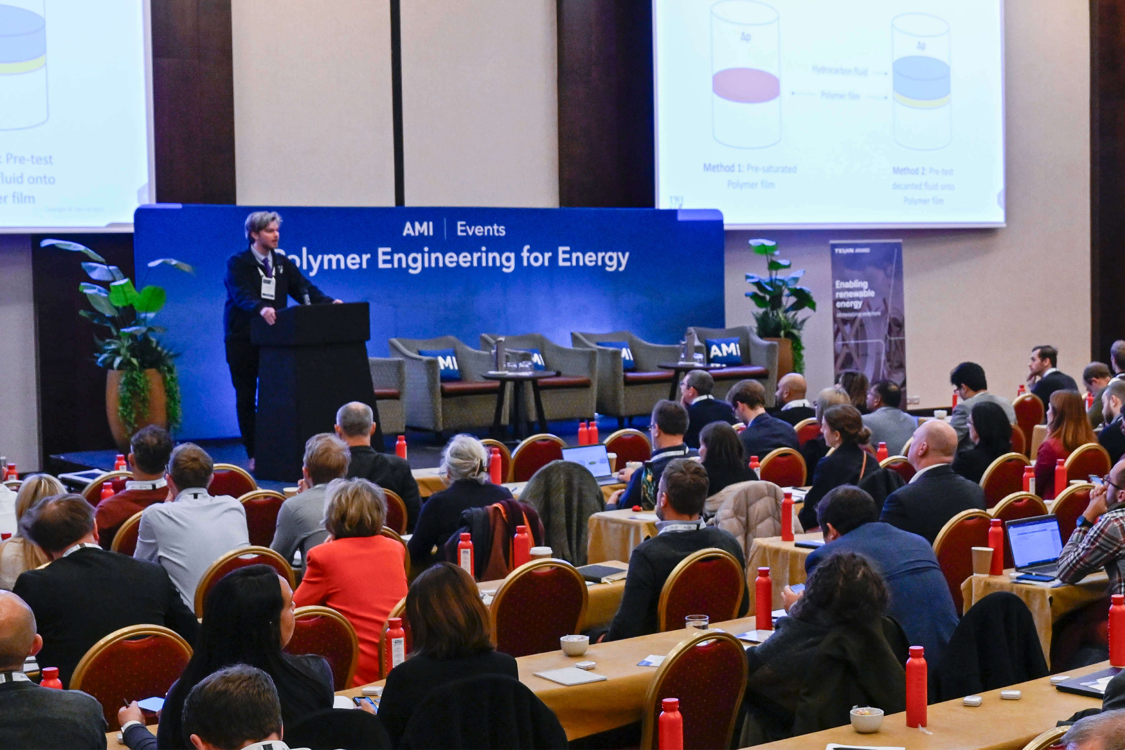 Photo of conference speaker at an AMI event