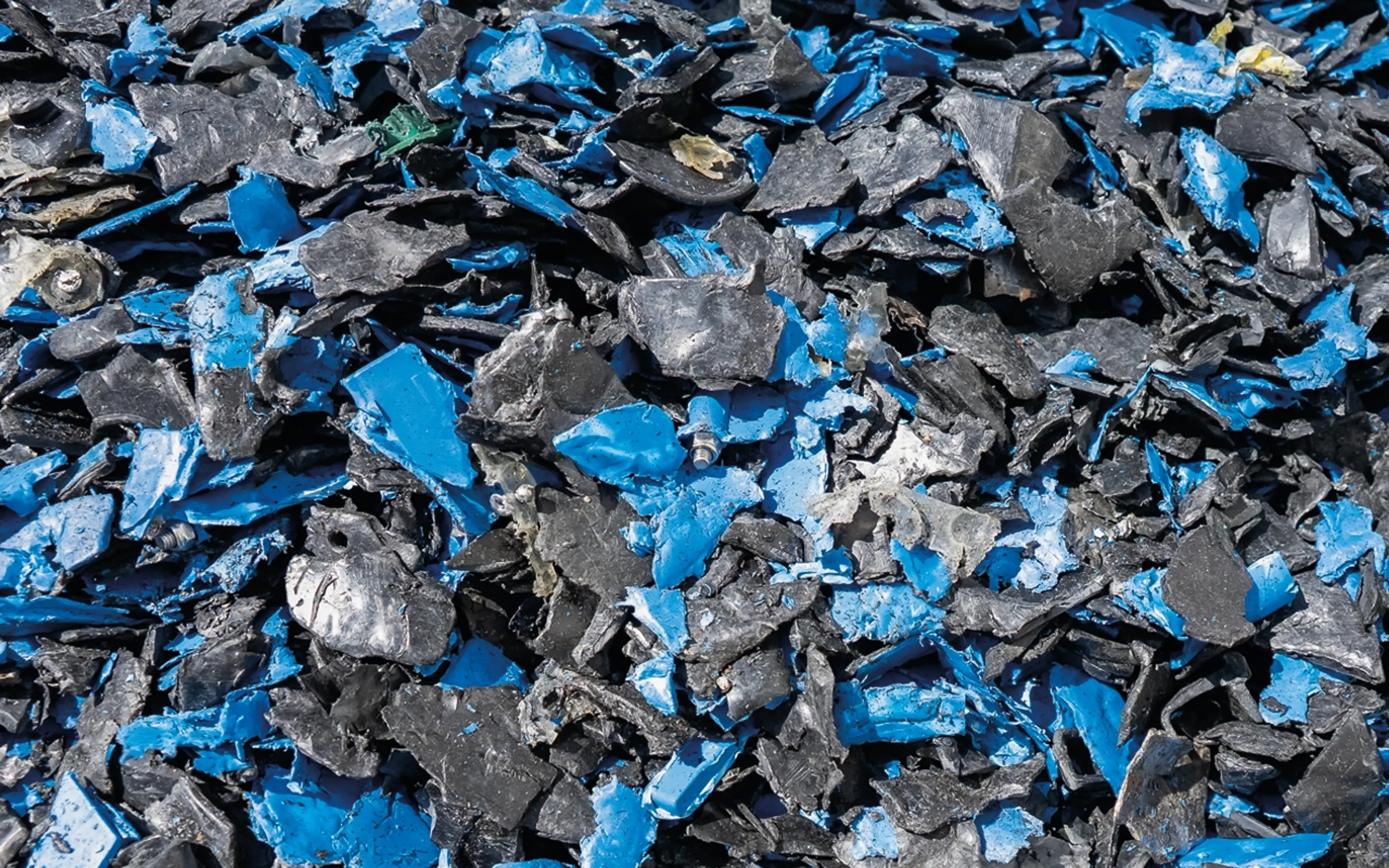 Black and blue shredded plastic
