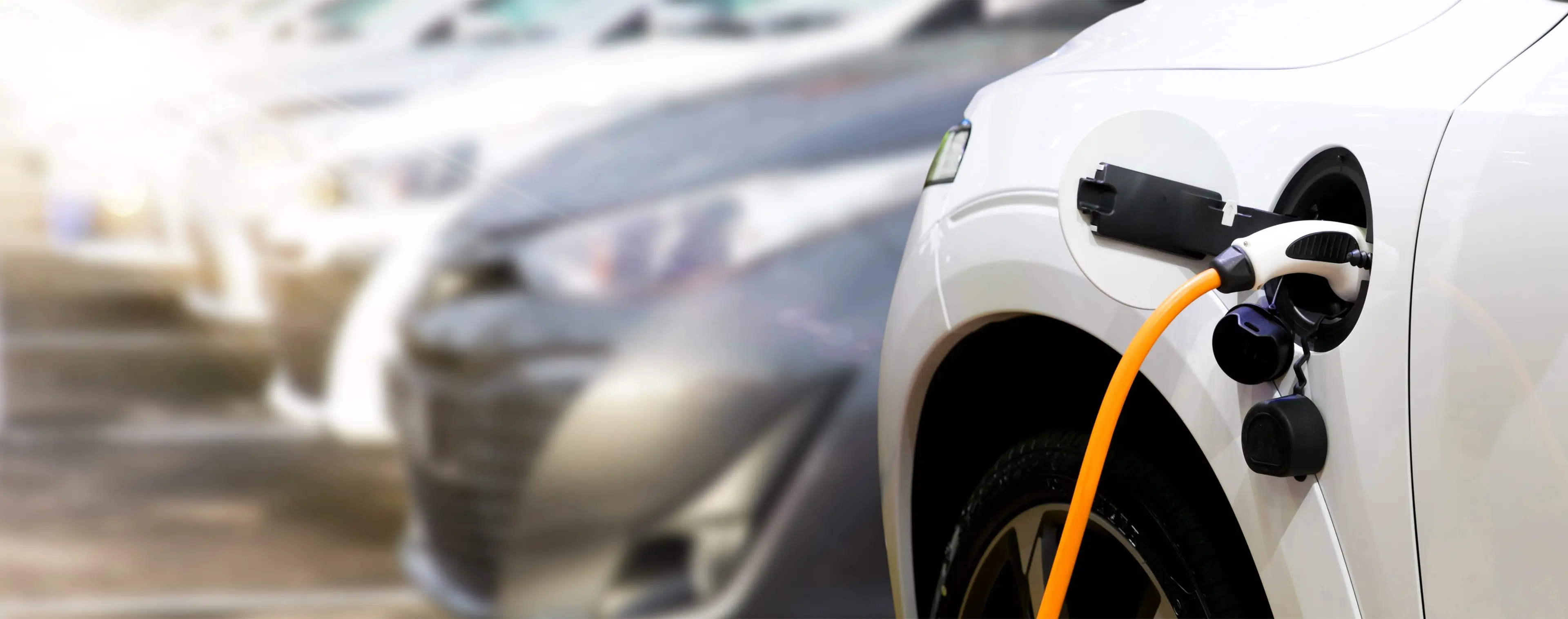 White EV at a charging point